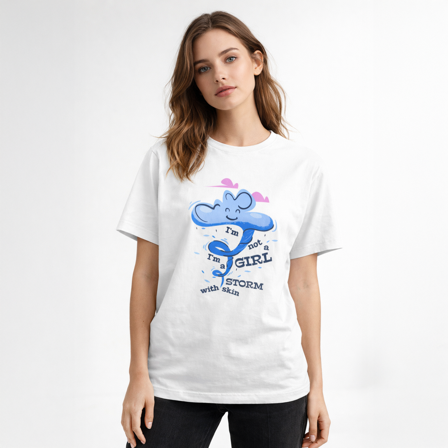Woman wearing a white t-shirt with a graphic design on a plain background