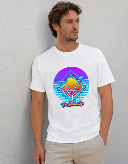Man wearing a white t-shirt with a colorful graphic design against a gray wall.